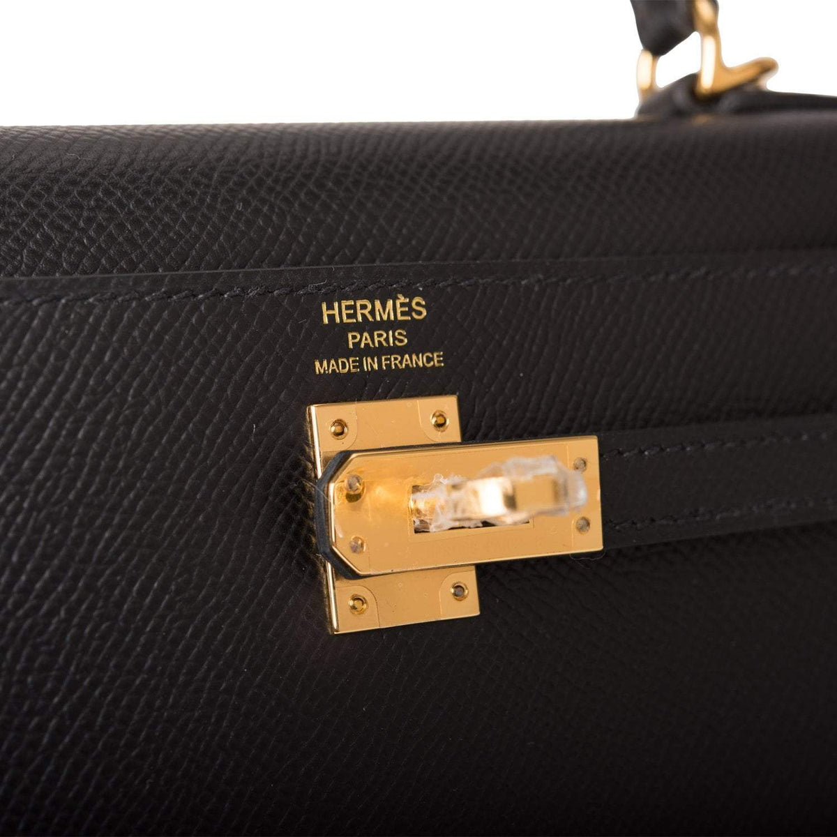 Top-down view showing handle, stitching, and Sellier structure