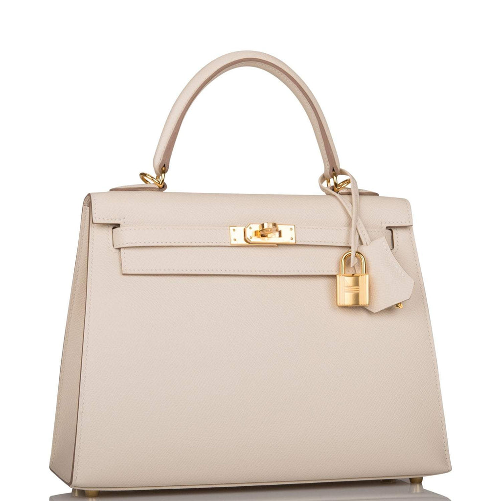 Side profile of Hermes Kelly Sellier 25 in ivory Epsom leather