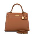 Front view of Hermes Kelly Sellier 25 in Gold Epsom with gold hardware