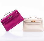 Hermes Kelly Mini Pochette Rose Pourpre Swift Palladium Hardware, Top handle and flap detail with palladium tu