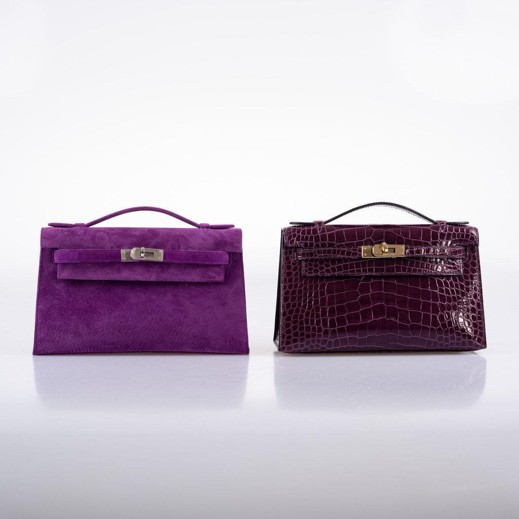 Hermes Kelly Pochette Violet Veau Doblis Suede Palladium Hardware, Scale view of the pochette carried by hand