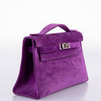 Hermes Kelly Pochette Violet Veau Doblis Suede Palladium Hardware, highlighting compact proportions