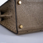 Hermes Kelly 28 Sellier Mousse Ostrich Gold Hardware - Circle W, Diagonal side-angle showcasing sheen and stru