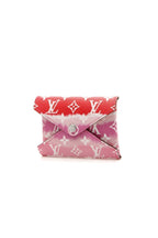 The Louis Vuitton Escale Kirigami pochette displayed on a surface