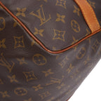 A profile view of the bag with its sides cinched