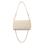 A detailed shot of the gold-tone chain