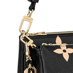 The small removable pouch being used as a clutch