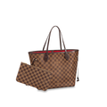 A shot highlighting the contrast between the Damier Ebene canvas and the natural cowhide trim