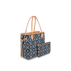 A wide view of the overall Monogram pattern on the textile