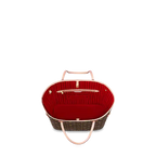 The bag carried on the forearm, showcasing its elegant proportion.