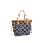 The Louis Vuitton Neverfull MM tote placed on a bench