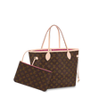 The removable pouch attached to the interior D-ring.