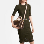 The Louis Vuitton Speedy Bandoulière 25 handbag displayed upright