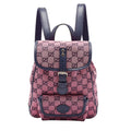 Gucci GG Canvas Backpack - Pink in Pink - front view showing the bag's shape, material finish and visible design details.